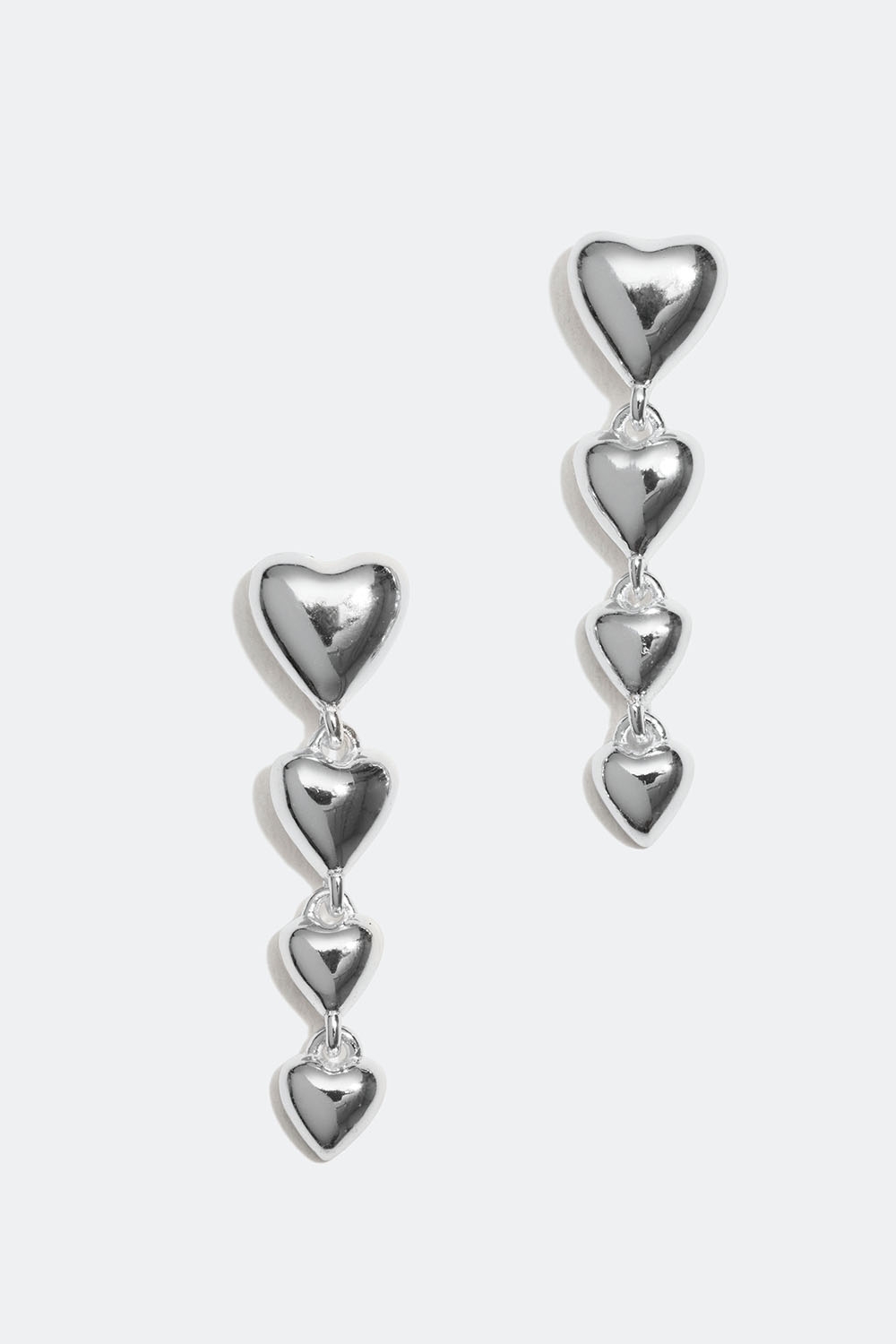 Øreringe i ægte sølv med hængende hjerter i gruppen Smykker / Øreringe hos Glitter (553002731001)