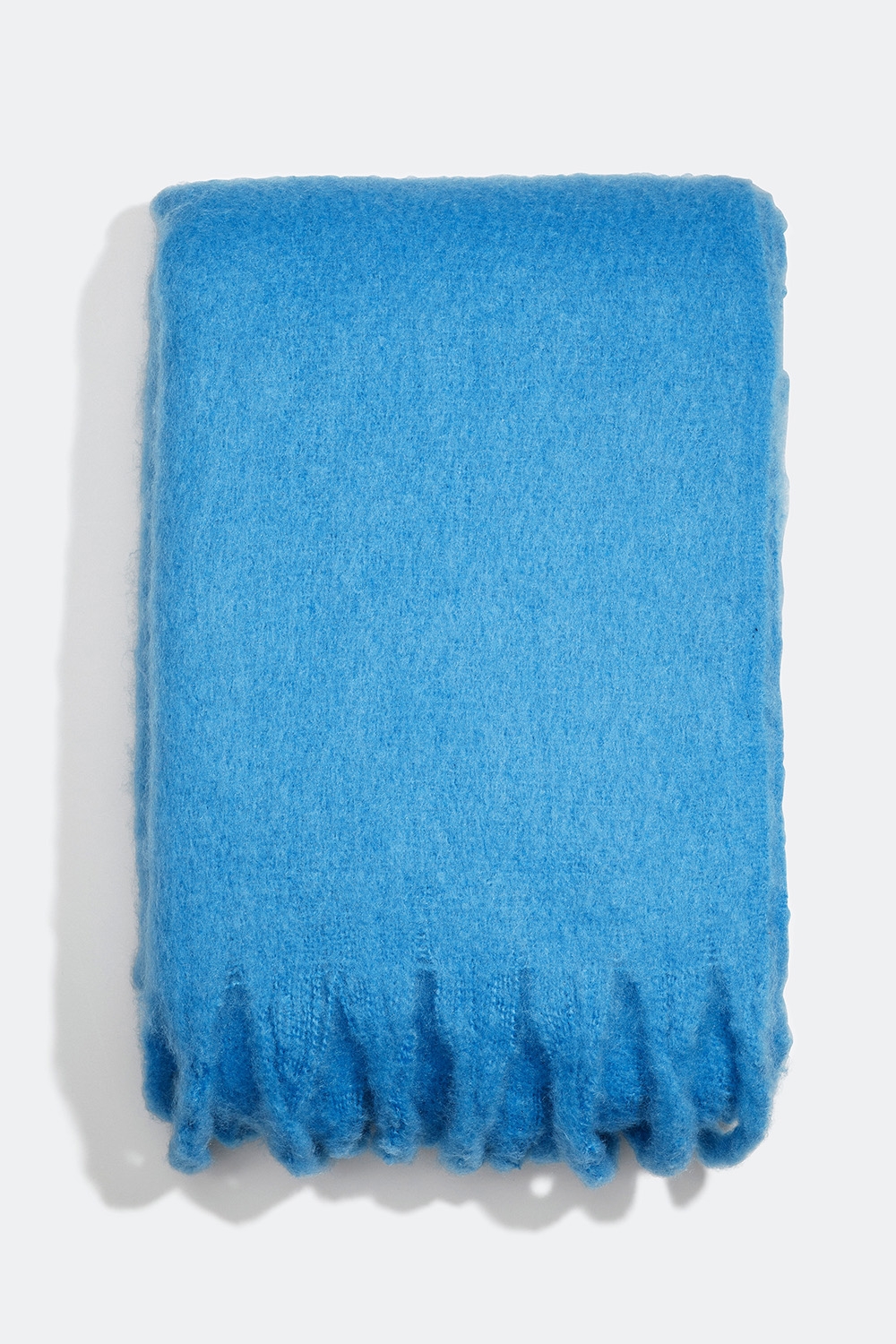 Børstet blåt halstørklæde med frynser i gruppen Tilbehør / Strik / Halstørklæde hos Glitter (171000197000)