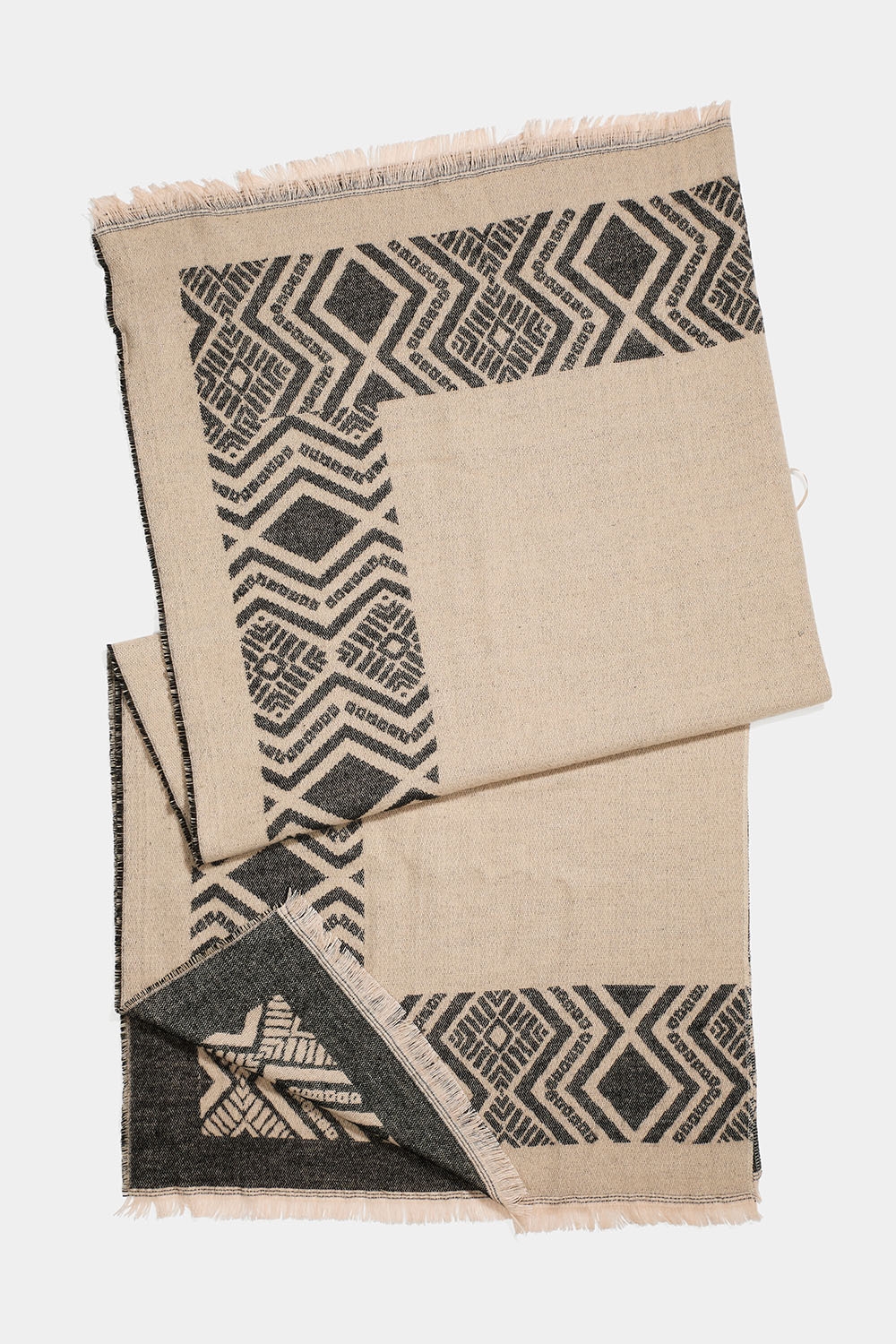 Beige poncho med mønster i gruppen Accessories / Strik / Ponchoer hos Glitter (171001378300)
