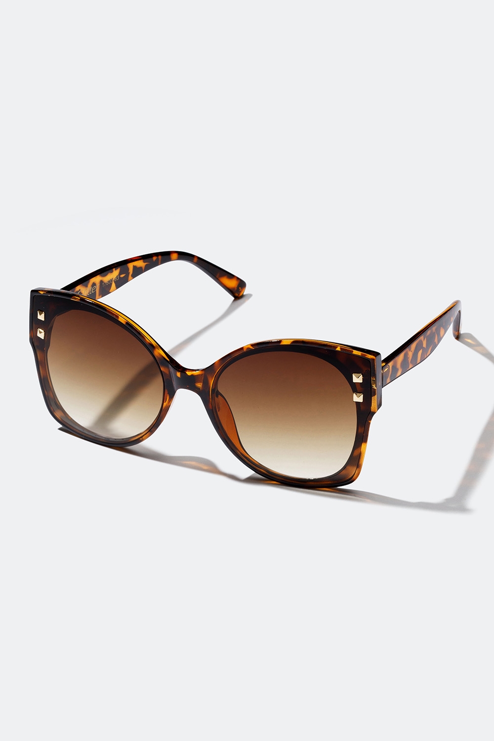 Oversize solbriller i skildpadde med gulddetaljer i gruppen Solbriller hos Glitter (176000630700)