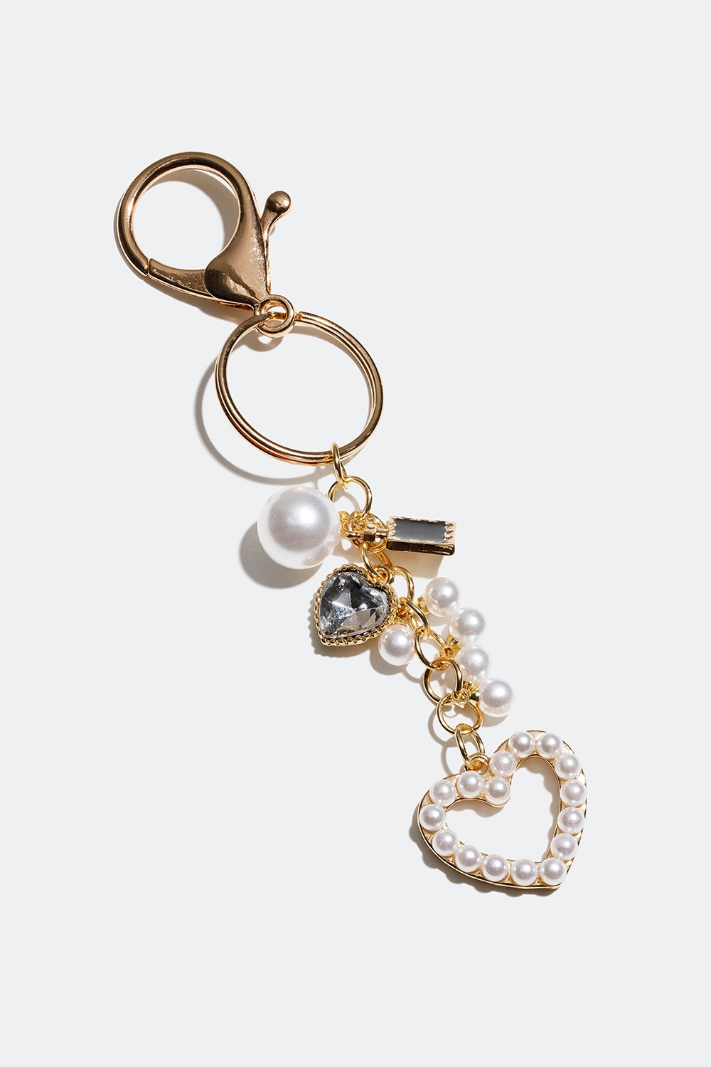 Guldfarvet nøglering med vedhæng med hjerte og perler i gruppen Accessories / Nøgleringe hos Glitter (177000262000)