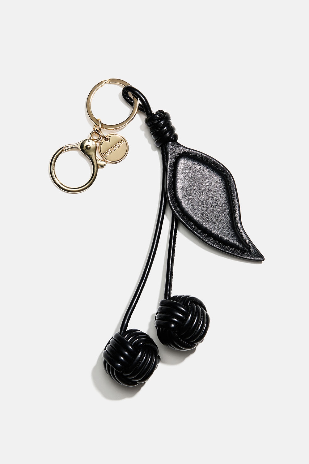 Taskeudsmykning med kirsebær i sort imiteret læder i gruppen Tasker / Bag charms hos Glitter (177000709400)