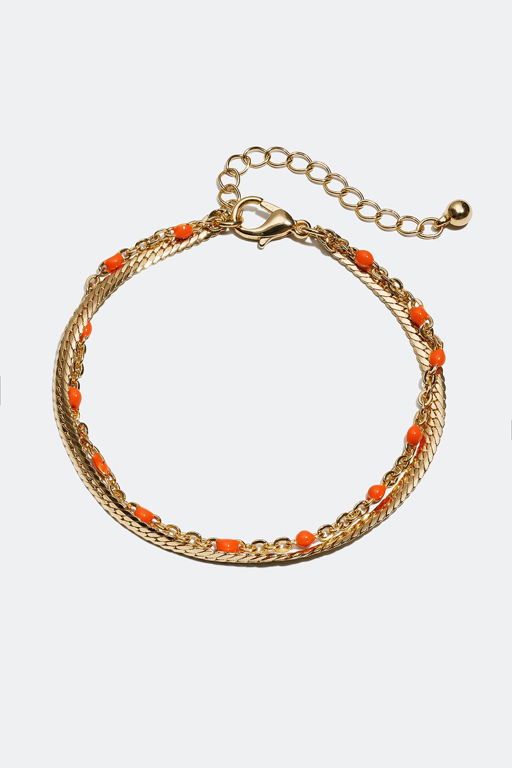 Guldfarvet armbånd med detaljer i orange i gruppen Smykker / Armbånd / Tynde hos Glitter (251000594502)