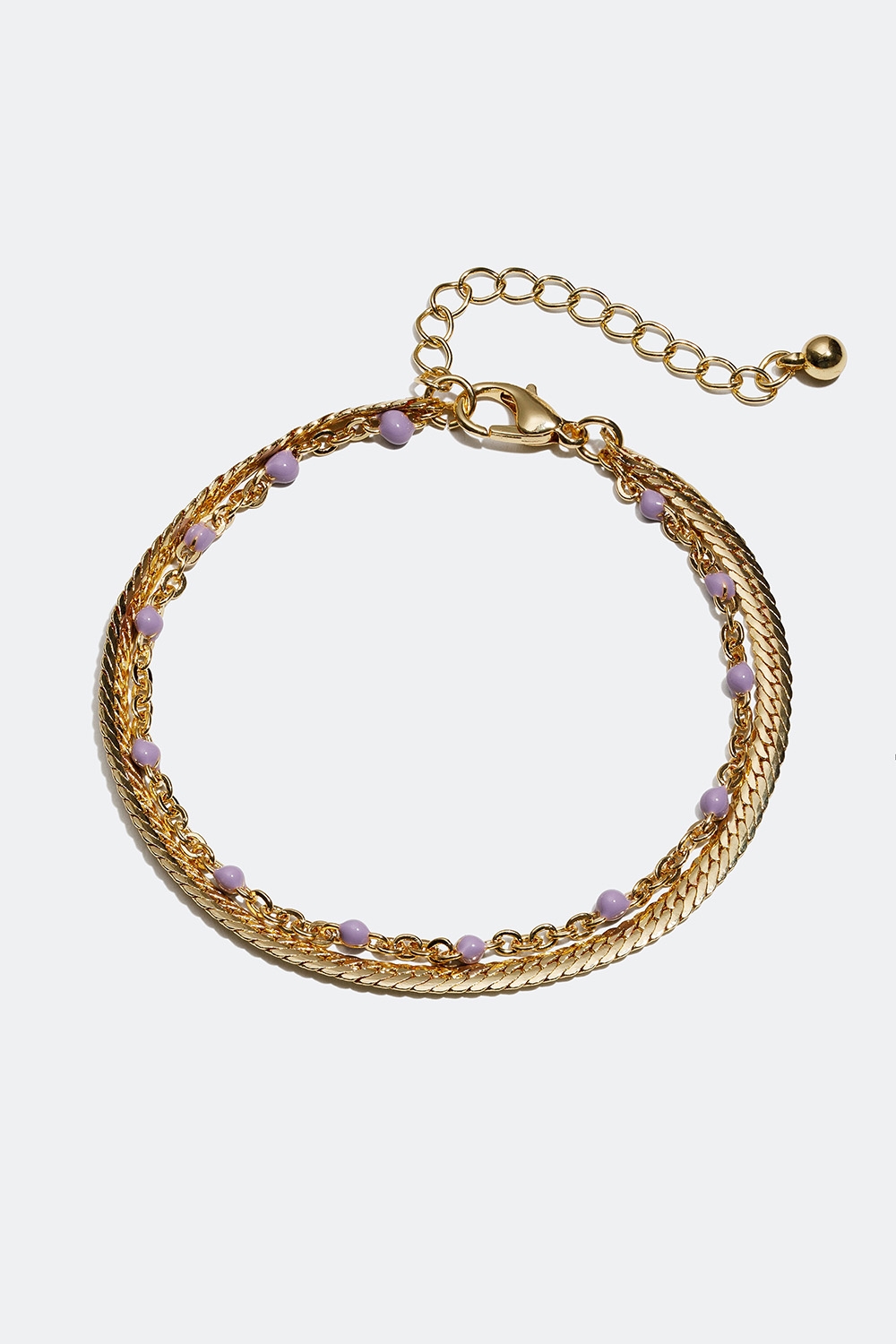 Guldfarvet armbånd med detaljer i lilla i gruppen Smykker / Armbånd / Tynde hos Glitter (251000596502)