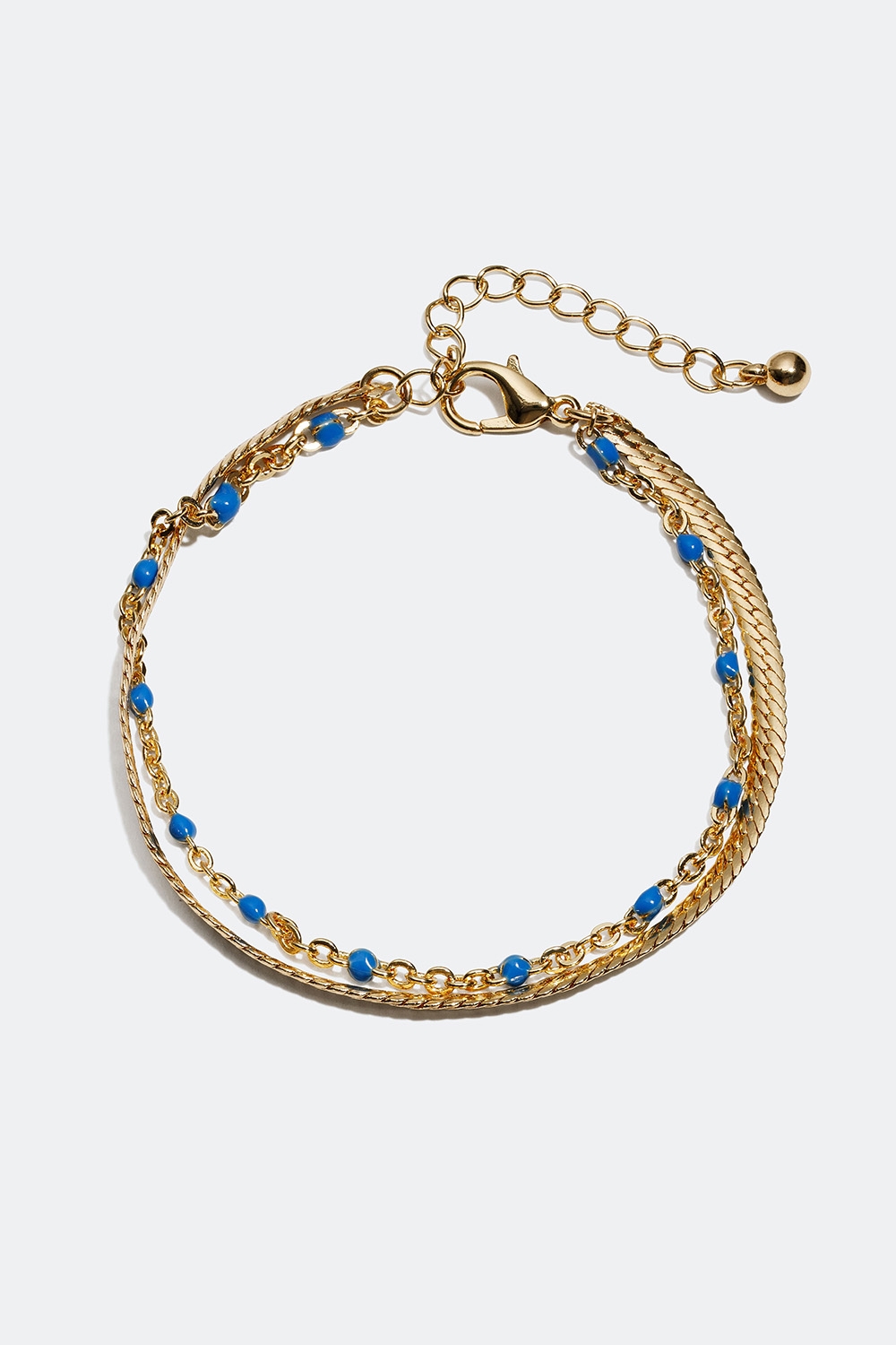 Guldfarvet armbånd med detaljer i blåt i gruppen Smykker / Armbånd / Tynde hos Glitter (251000597002)
