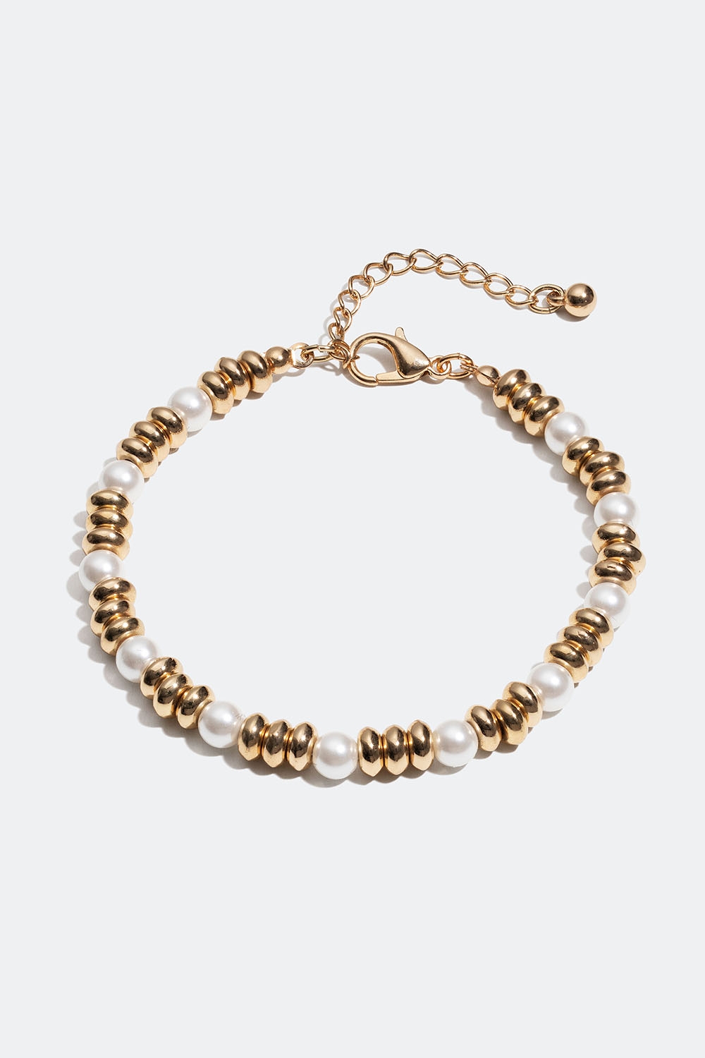 Armbånd med guldfarvede og hvide perler i gruppen Smykker / Armbånd / Tynde hos Glitter (251000912002)