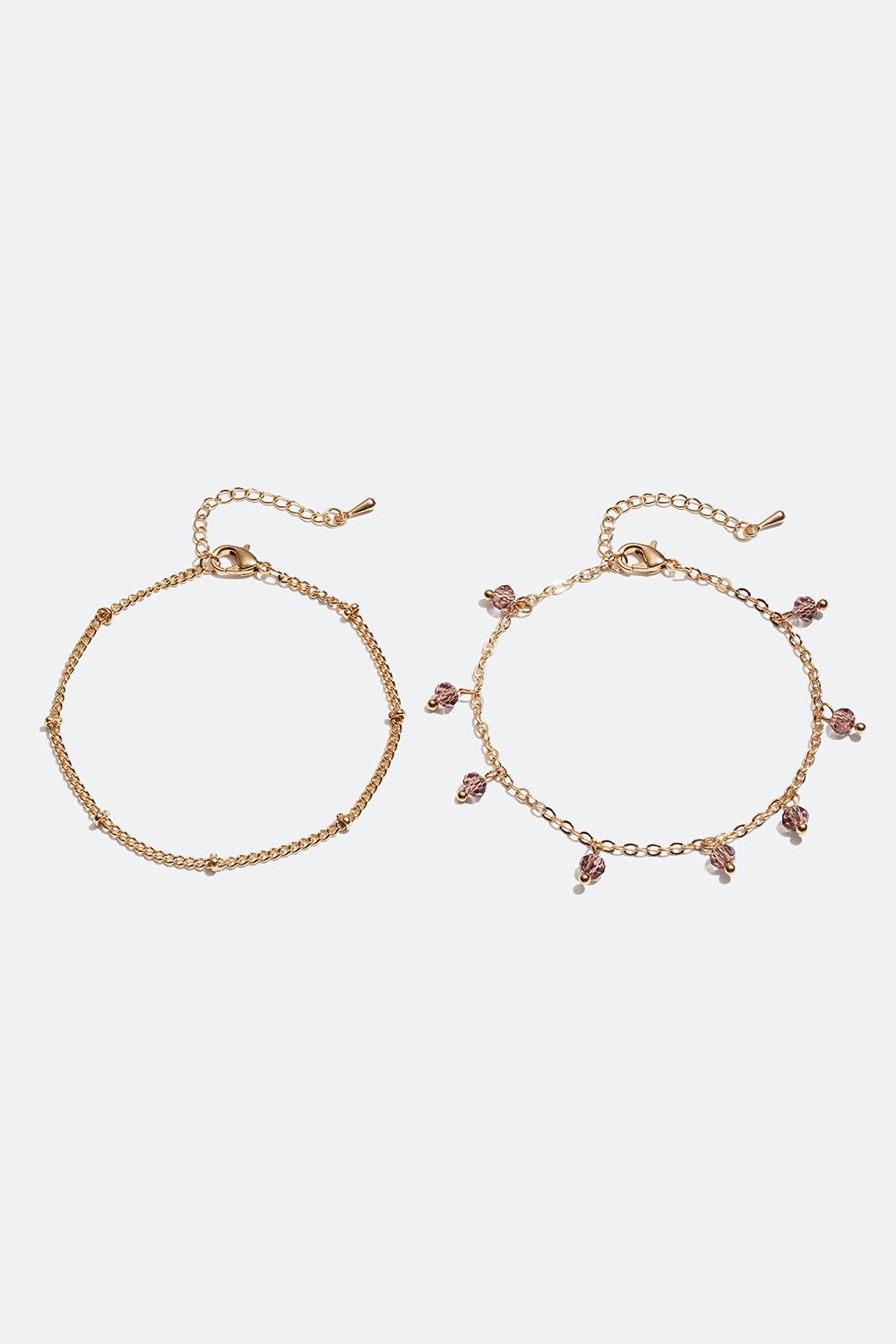 Guldfarvet kædearmbånd med lilla perler, 2-pak i gruppen Smykker / Armbånd / Flerpak hos Glitter (251000986502)
