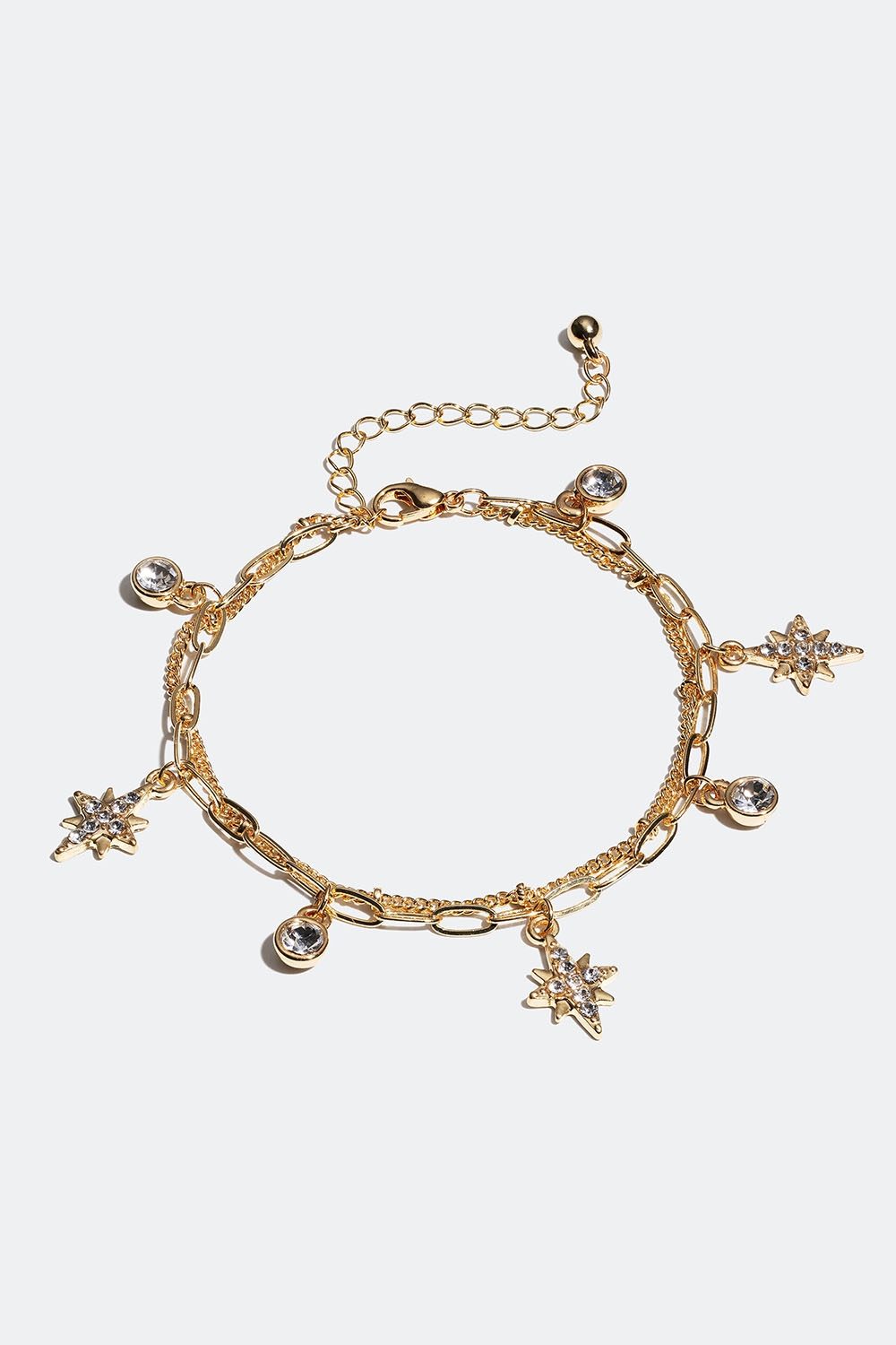 Guldfarvet dobbelt armbånd med runde glassten og stjerner i gruppen Smykker / Armbånd / Tynde hos Glitter (251001072002)