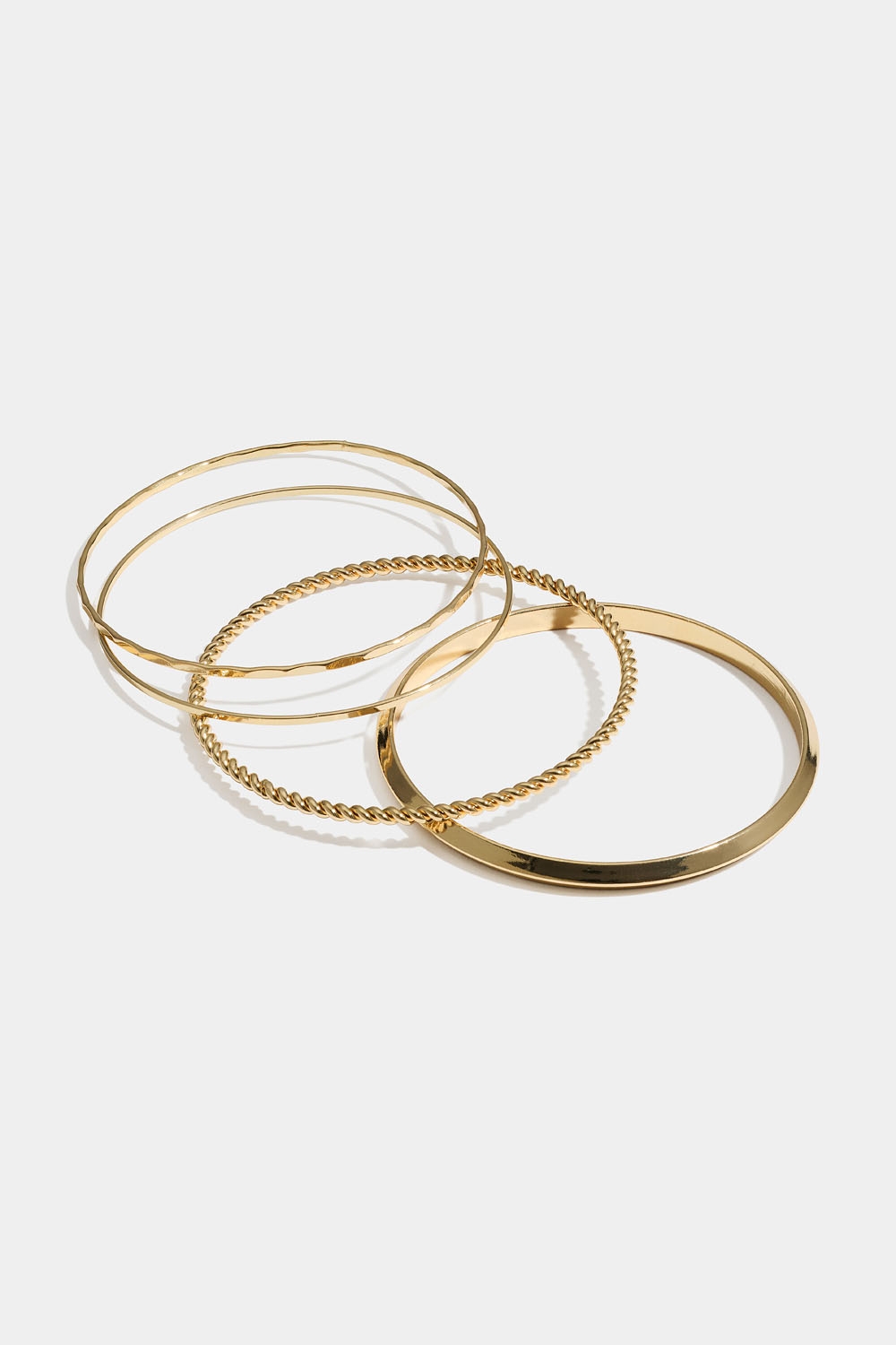 Tynde armringe, guldfarvede, 4-pak i gruppen Smykker / Armbånd hos Glitter (251001662002)