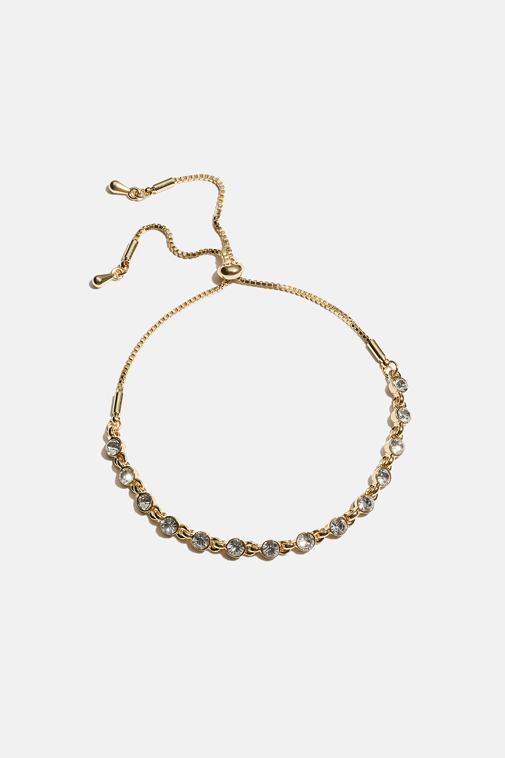 Guldfarvet armbånd med små, runde glassten i gruppen Smykker / Armbånd / Similiarmbånd hos Glitter (251002052002)