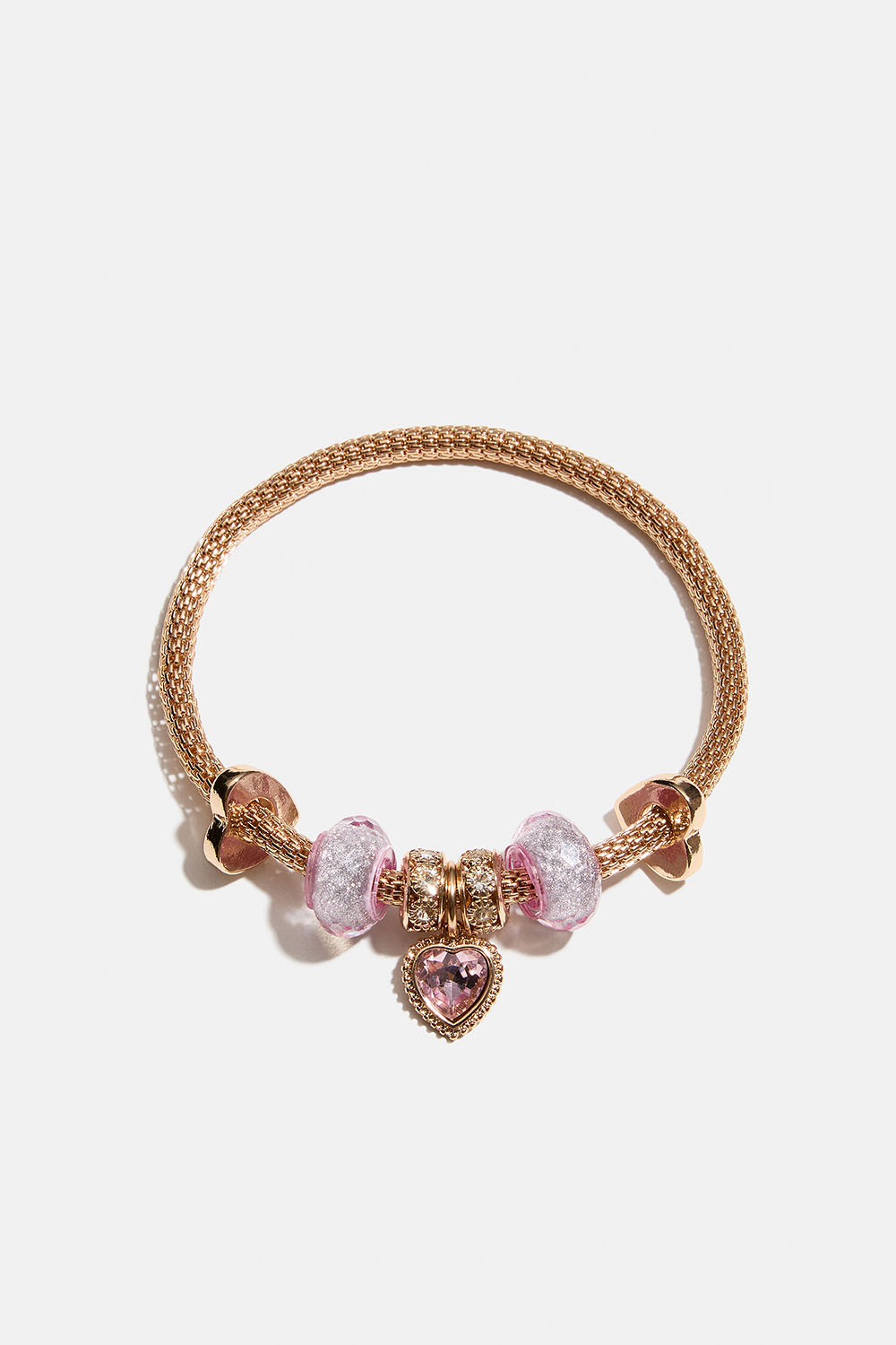 Elastisk guldfarvet armbånd med vedhæng i lyserøde detaljer i gruppen Smykker / Armbånd hos Glitter (251002065102)