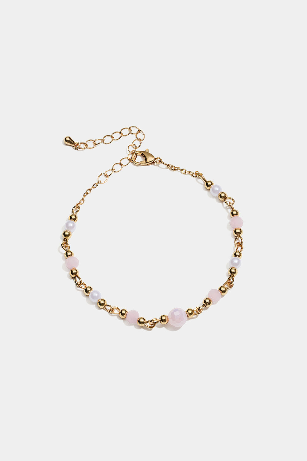 Guldfarvet armbånd med lyserøde og hvide perler i gruppen Smykker / Armbånd hos Glitter (251002295002)