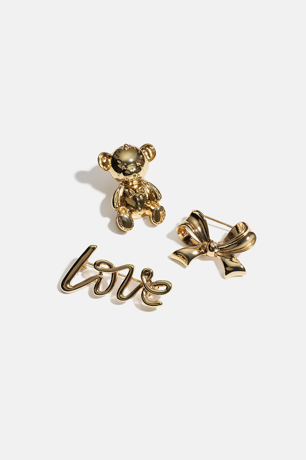Guldfarvede brocher med sløjfe, bjørn og Love, 3-pak i gruppen Smykker / Brocher hos Glitter (252000192002)