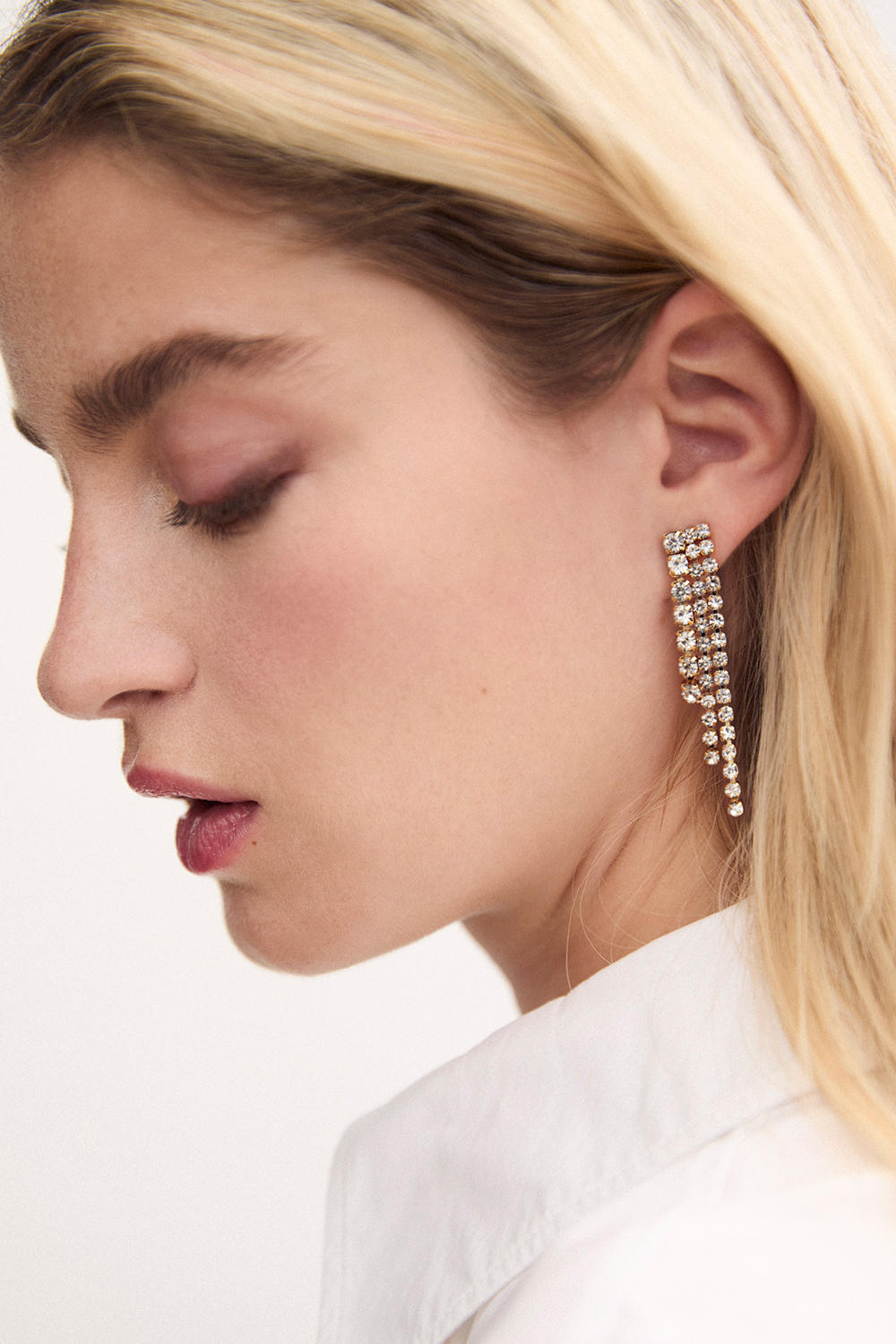 Guldfarvede rhinsten-øreringe med tre led i gruppen Smykker / Øreringe / Similiøreringe hos Glitter (253005330202)