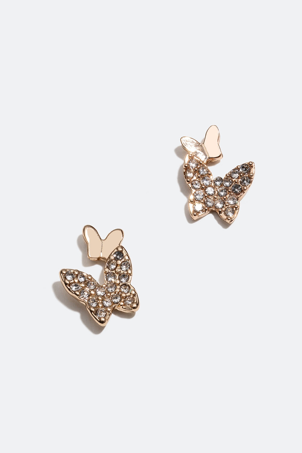 Små guldfarvede øreringe med sommerfugle og glassten i gruppen Smykker / Øreringe / Ørestikker hos Glitter (253005720202)