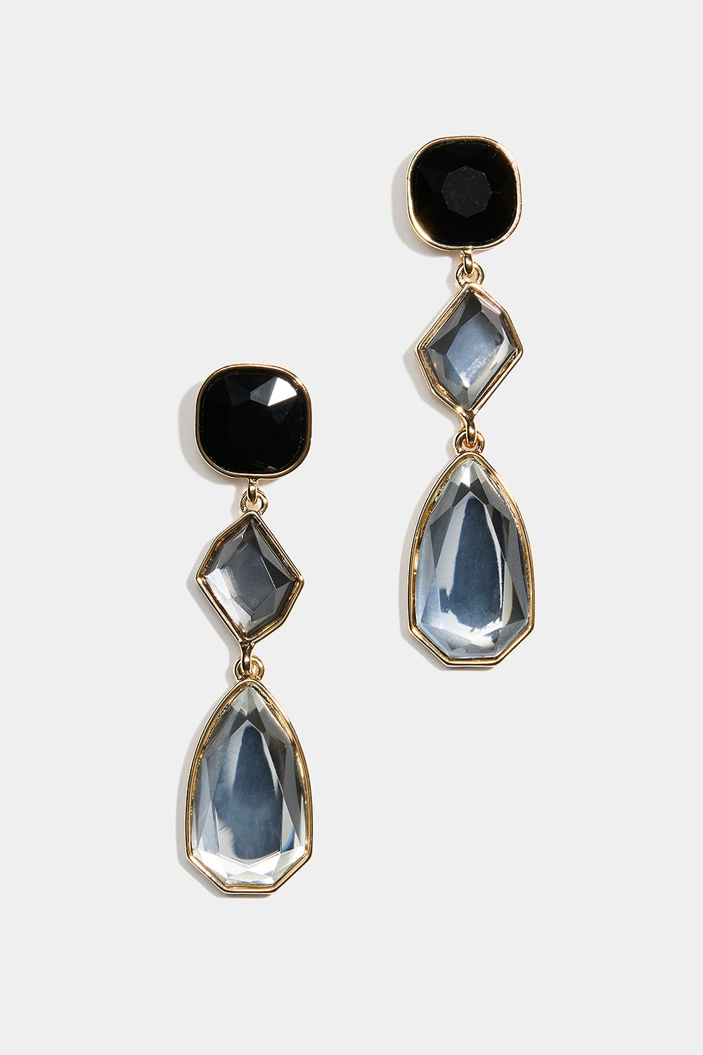 Lange øreringe med sorte og hvide sten i forskellige former i gruppen Smykker / Øreringe / Similiøreringe hos Glitter (253010329402)