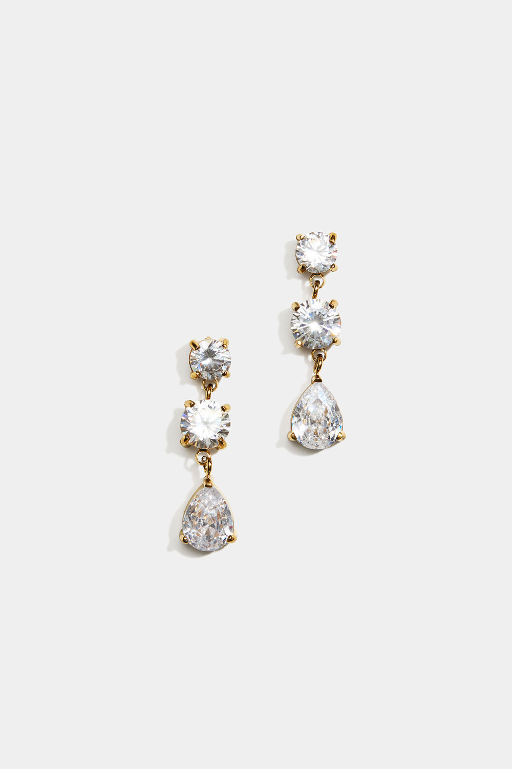 Øreringe i 18k forgyldt stål med runde og dråbeformede Cubic Zirconia-sten i gruppen Stainless Steel / 18 kt. guldbelagt stål hos Glitter (253012182000)