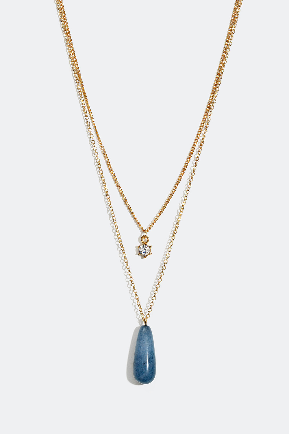 Guldfarvet dobbelt halskæde med sten i kunstharpiks og glas i gruppen Smykker / Halskæder / Halskæder med vedhæng hos Glitter (25400045)