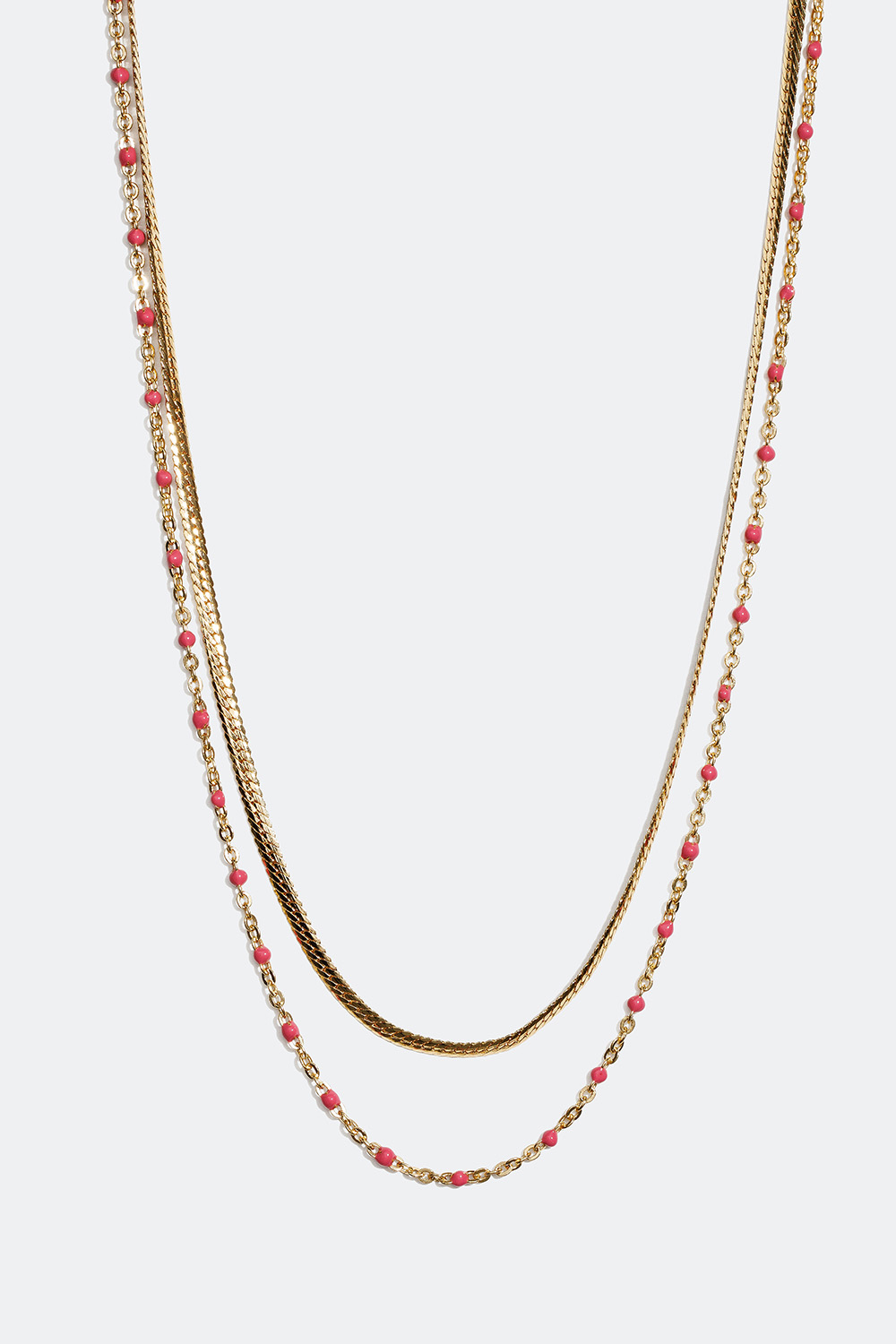 Guldfarvet dobbelt halskæde med detaljer i rosa i gruppen Smykker / Halskæder hos Glitter (254000855002)