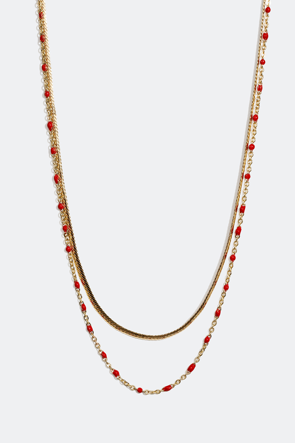 Guldfarvet dobbelt halskæde med detaljer i rødt i gruppen Smykker / Halskæder hos Glitter (254000856002)