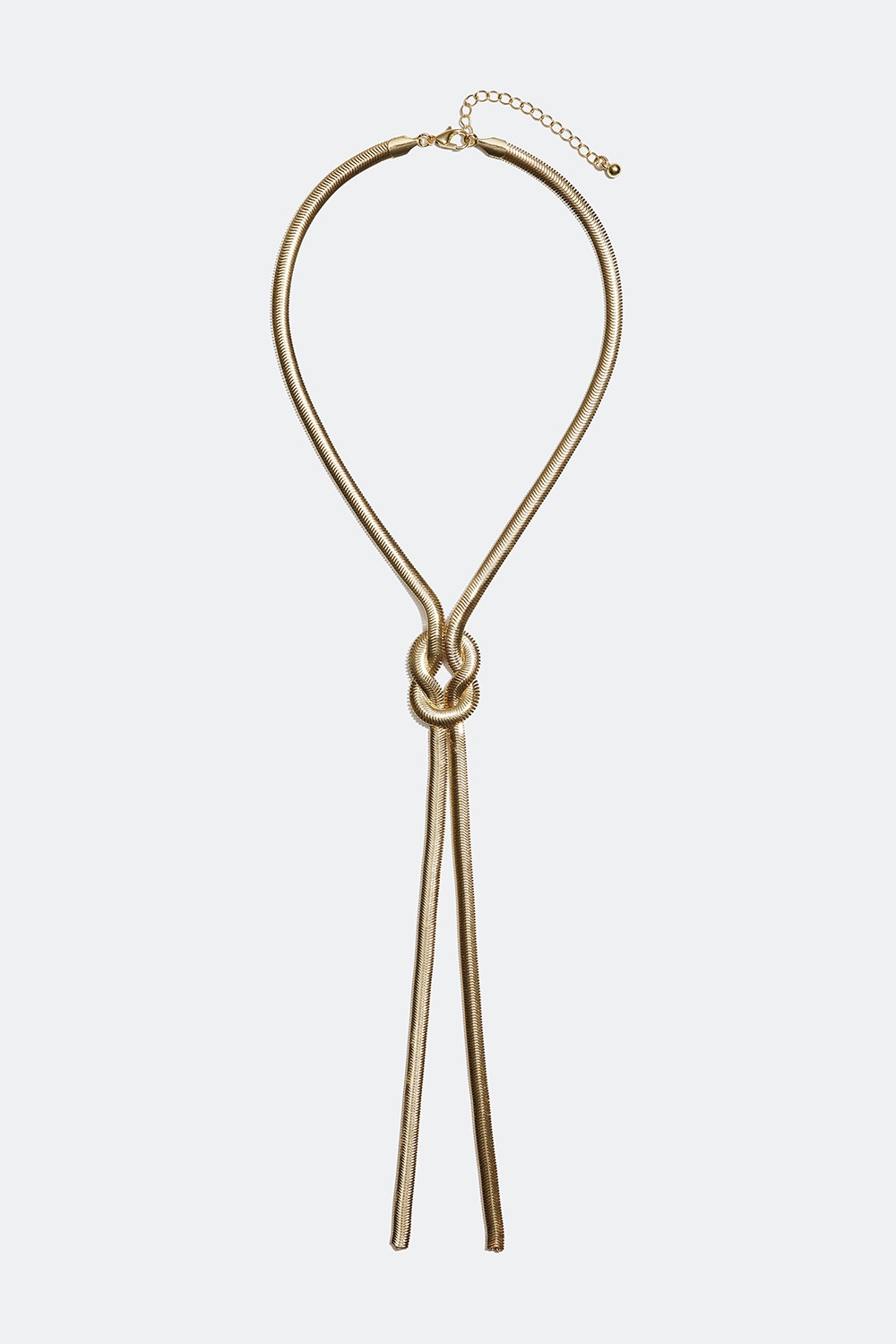 Lang guldfarvet halskæde med stram kæde og knude i gruppen Smykker / Halskæder hos Glitter (254001112002)
