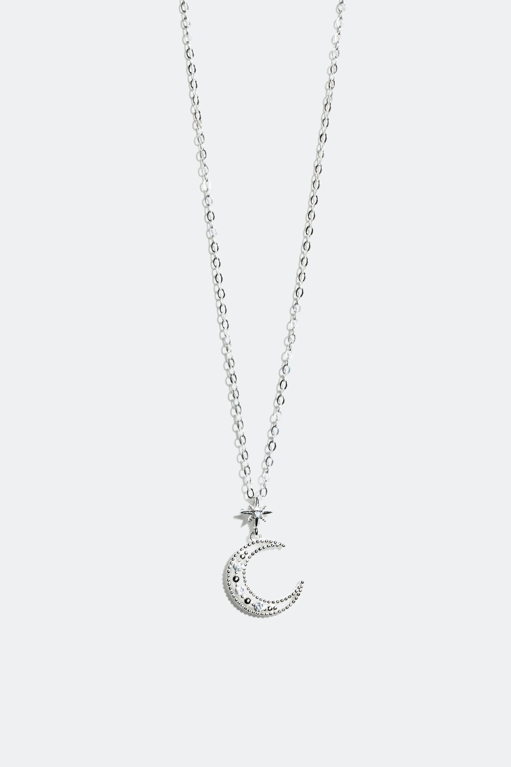 Sølvhalskæde med vedhæng formet som en måne og en stjerne i gruppen Smykker hos Glitter (322115)