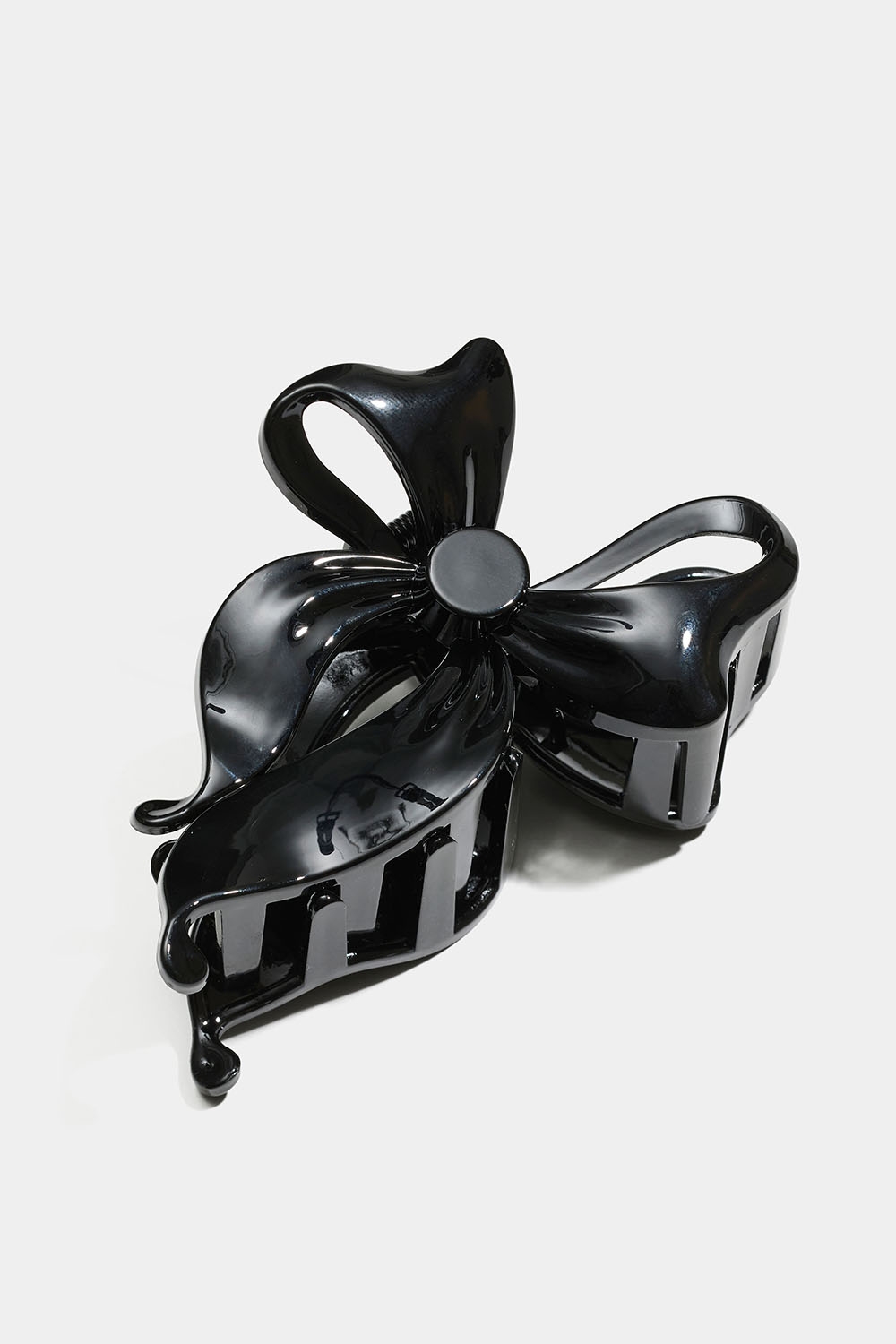 Sort sløjfeformet hårklemme i gruppen Håraccessories / Spænder & klemmer / Hårklemmer hos Glitter (331001789000)