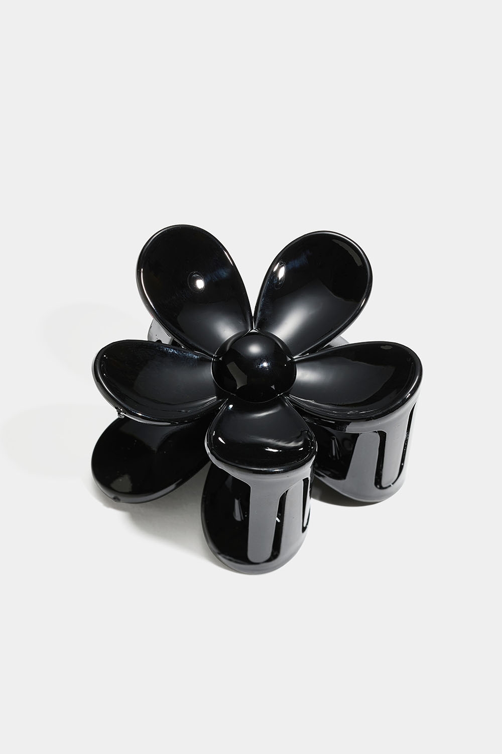 Sort blomsterformet hårspænde i gruppen Håraccessories / Spænder & klemmer / Hårklemmer hos Glitter (331001829000)