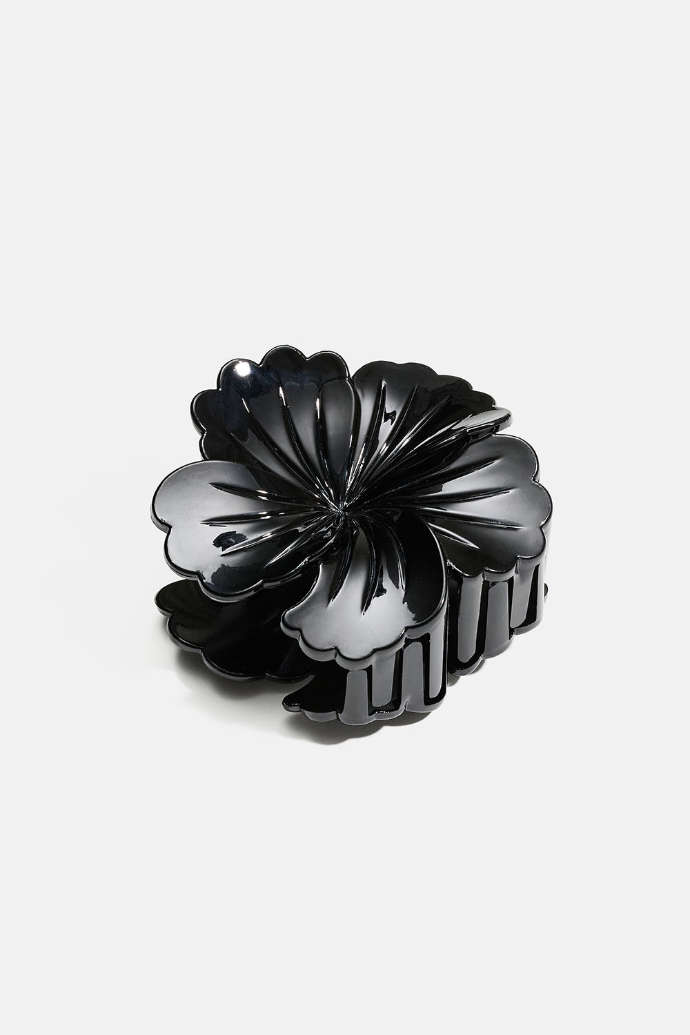 Sort, rund blomsterformet hårspænde i gruppen Håraccessories / Spænder & klemmer / Hårklemmer hos Glitter (331002169000)