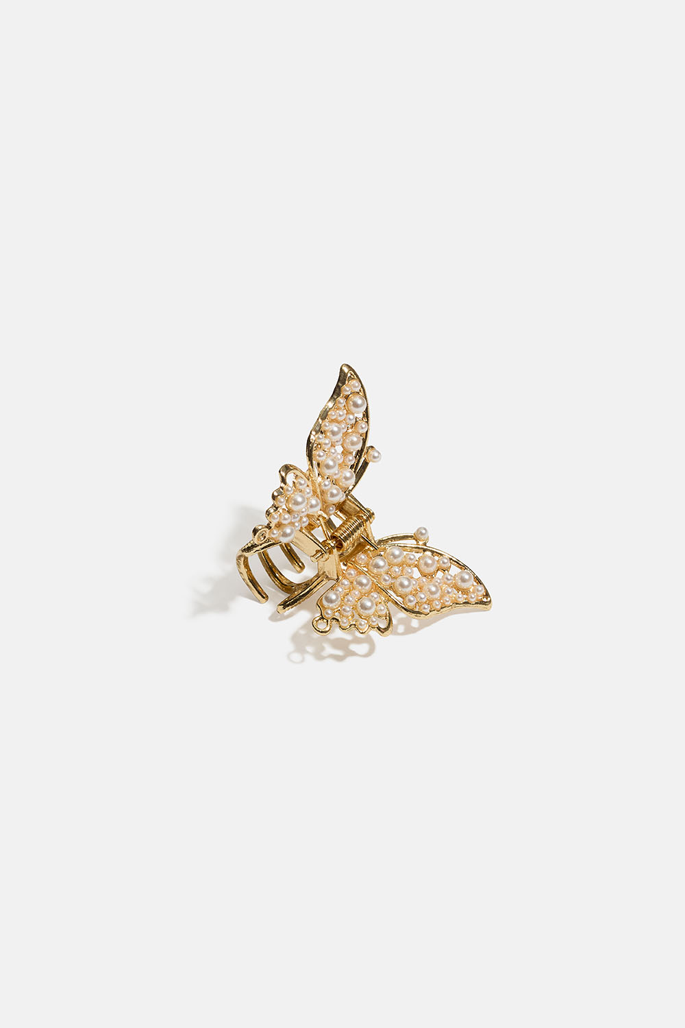 Lille guldfarvet hårspænde med sommerfugledesign og perler i gruppen Håraccessories / Spænder & klemmer / Hårklemmer hos Glitter (331002362000)