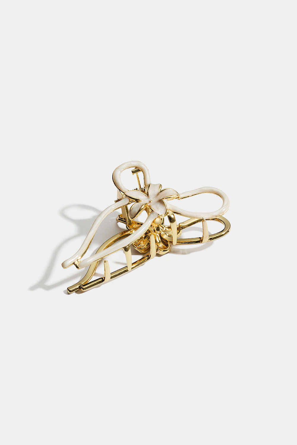 Guldfarvet hårspænde med blomster og hvide detaljer i gruppen Håraccessories / Spænder & klemmer / Hårklemmer hos Glitter (331002373100)