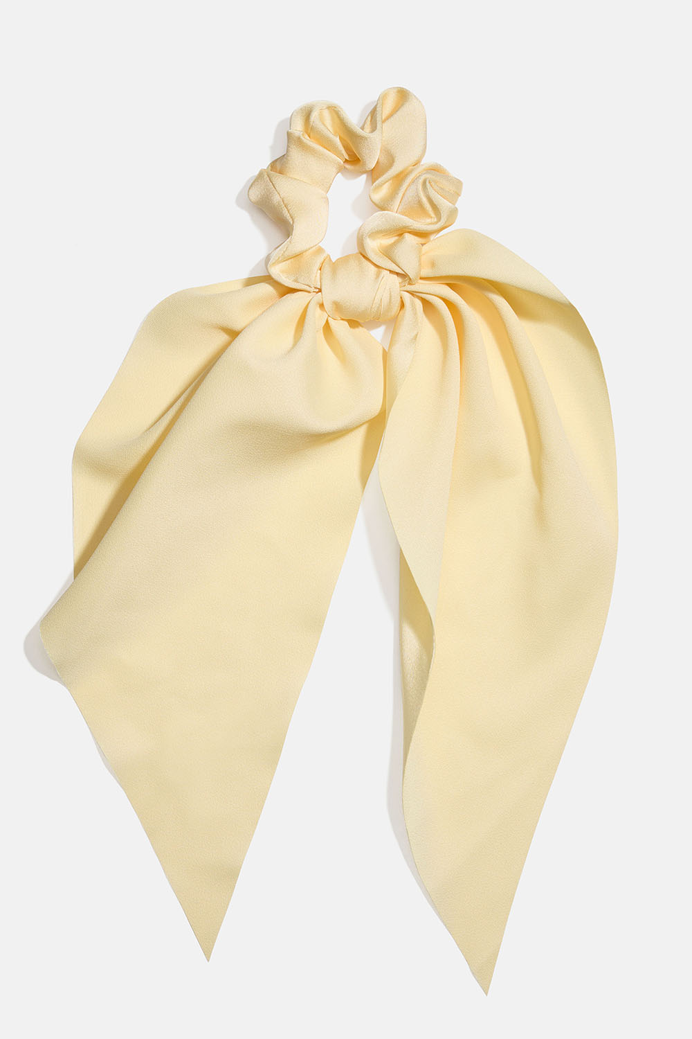 Gul scrunchie tail i gruppen Håraccessories / Scrunchies / Scrunchies med tørklædedetalje hos Glitter (332001654000)