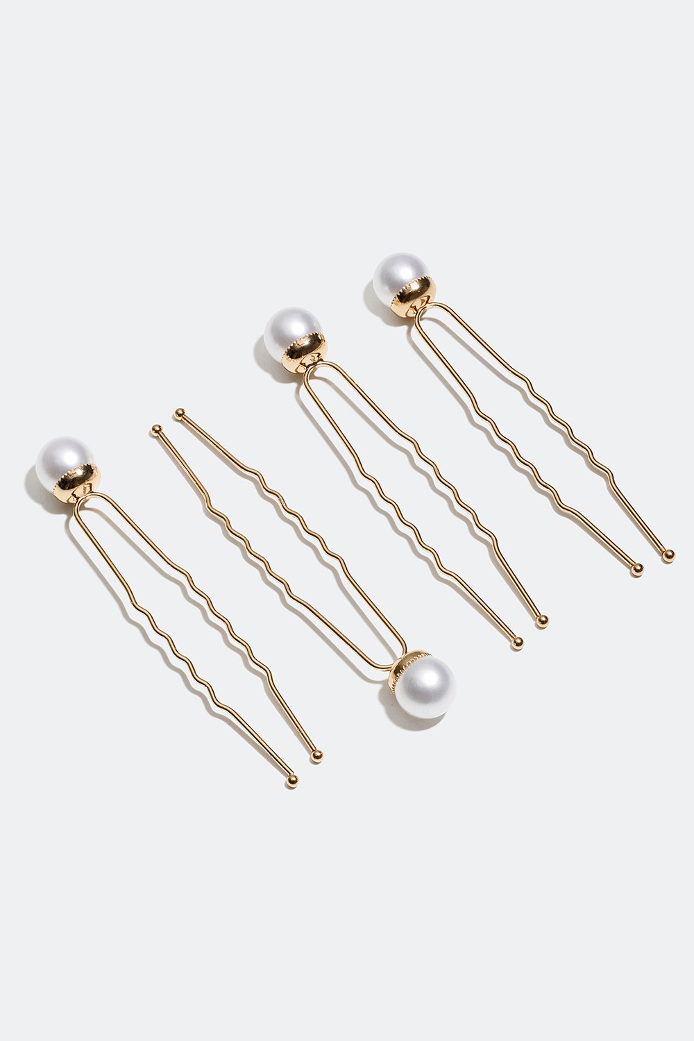 Opsætningsnåle med hvide perler, 4-pak i gruppen Håraccessories / Styling & hårredskaber / Hårnåle hos Glitter (334000073100)