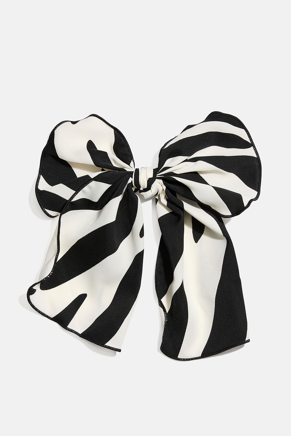 Hårspænde med sløjfe i zebramønsteret stof i gruppen Håraccessories / Spænder & klemmer / Hårpynt hos Glitter (335002080800)