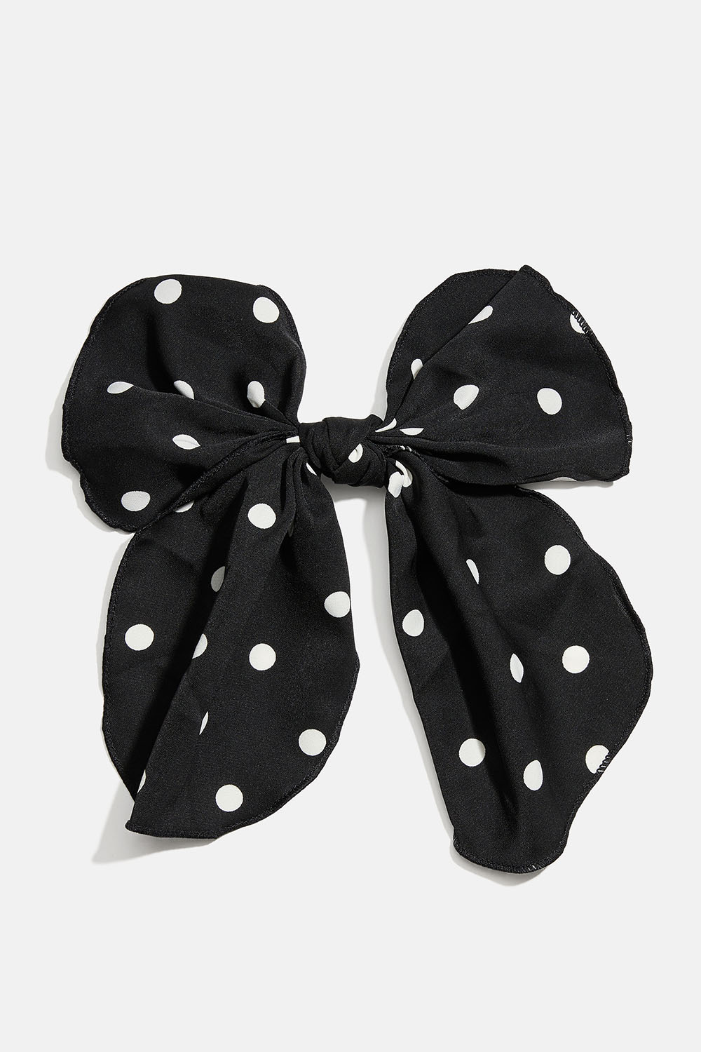 Hårspænde med sort sløjfe i prikket mønster i gruppen Håraccessories / Spænder & klemmer / Hårpynt hos Glitter (335002089400)