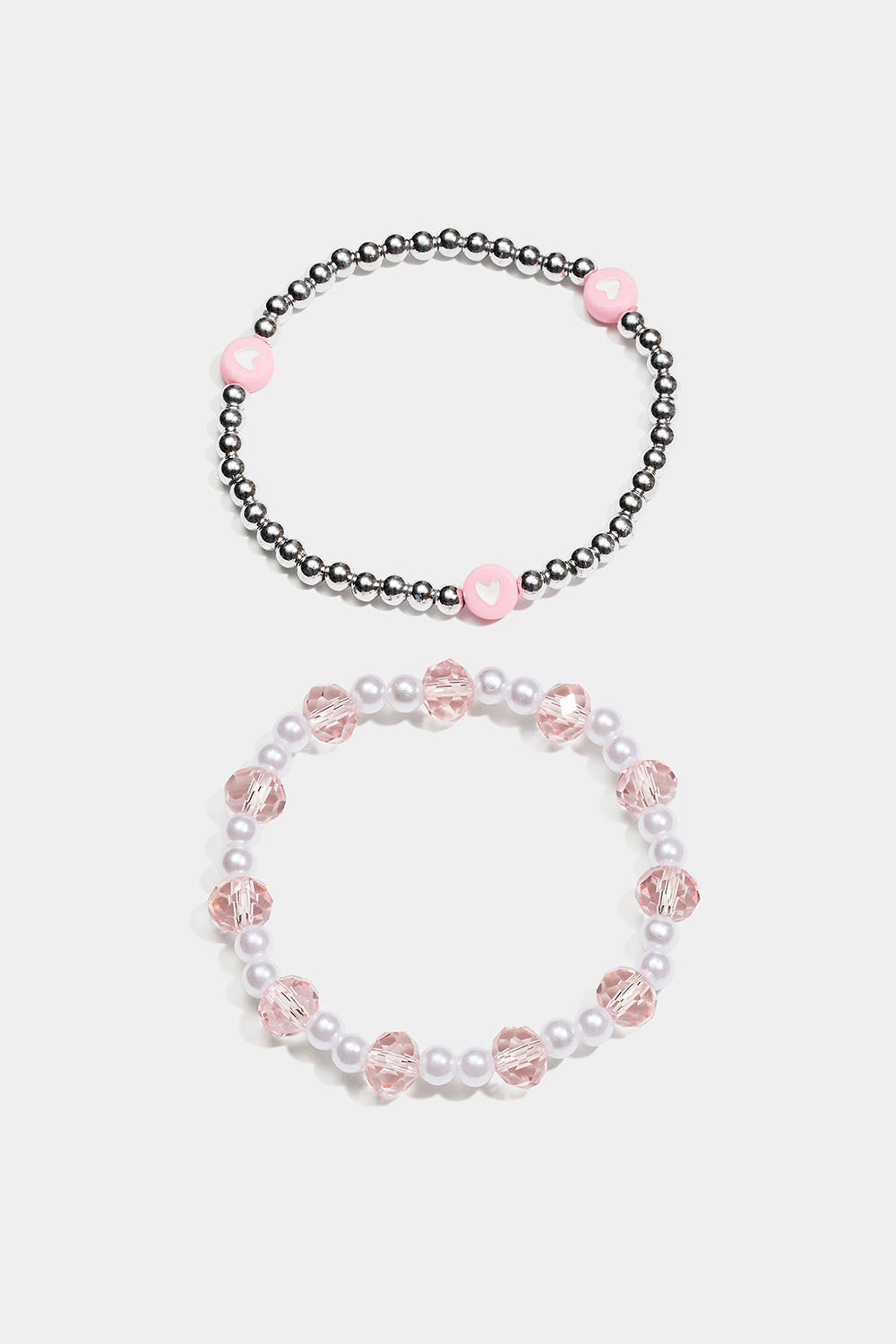 Elastiske armbånd med perler i lyserød, hvid og sølvfarvet i gruppen Børn / Børnesmykker / Børnearmbånd hos Glitter (402000469900)