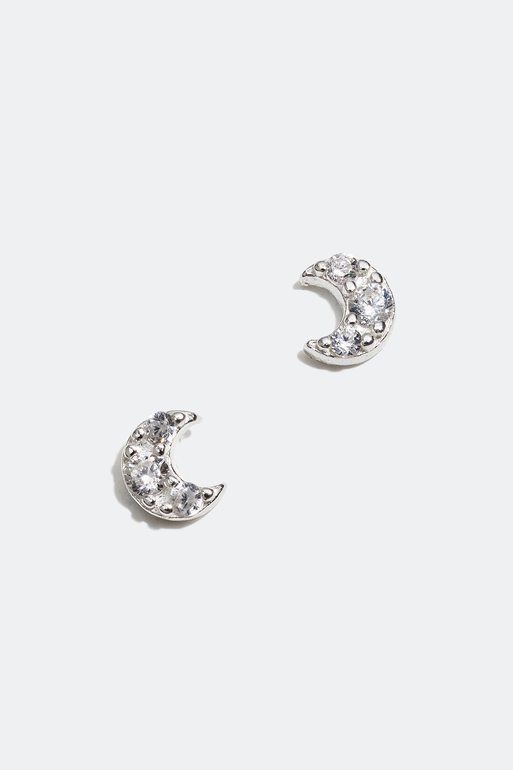 Små ørestikker i ægte sølv med måner og cubic zirconia i gruppen Børn / Børnesmykker / Børneøreringe hos Glitter (405000111001)