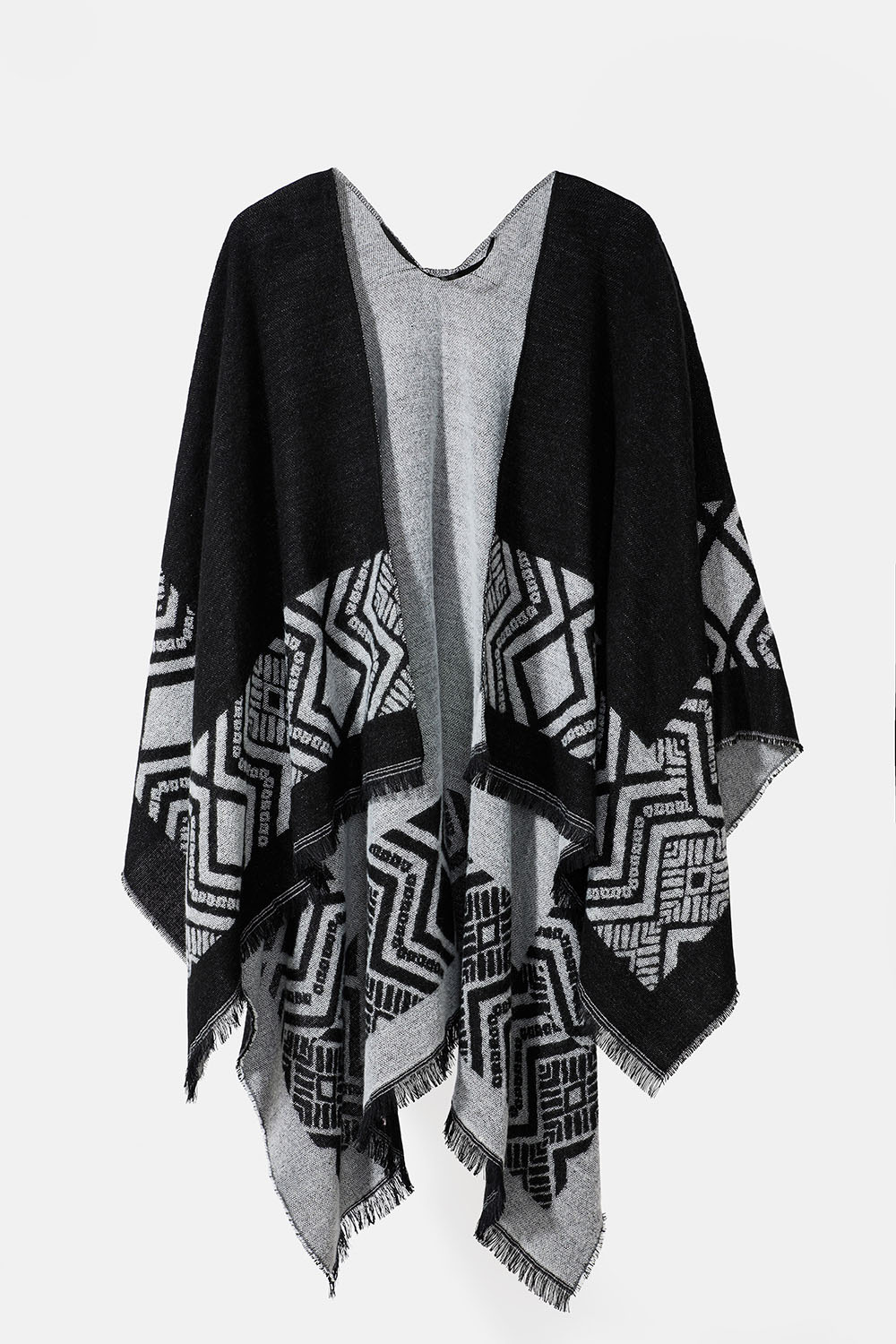 Sort poncho med mønster