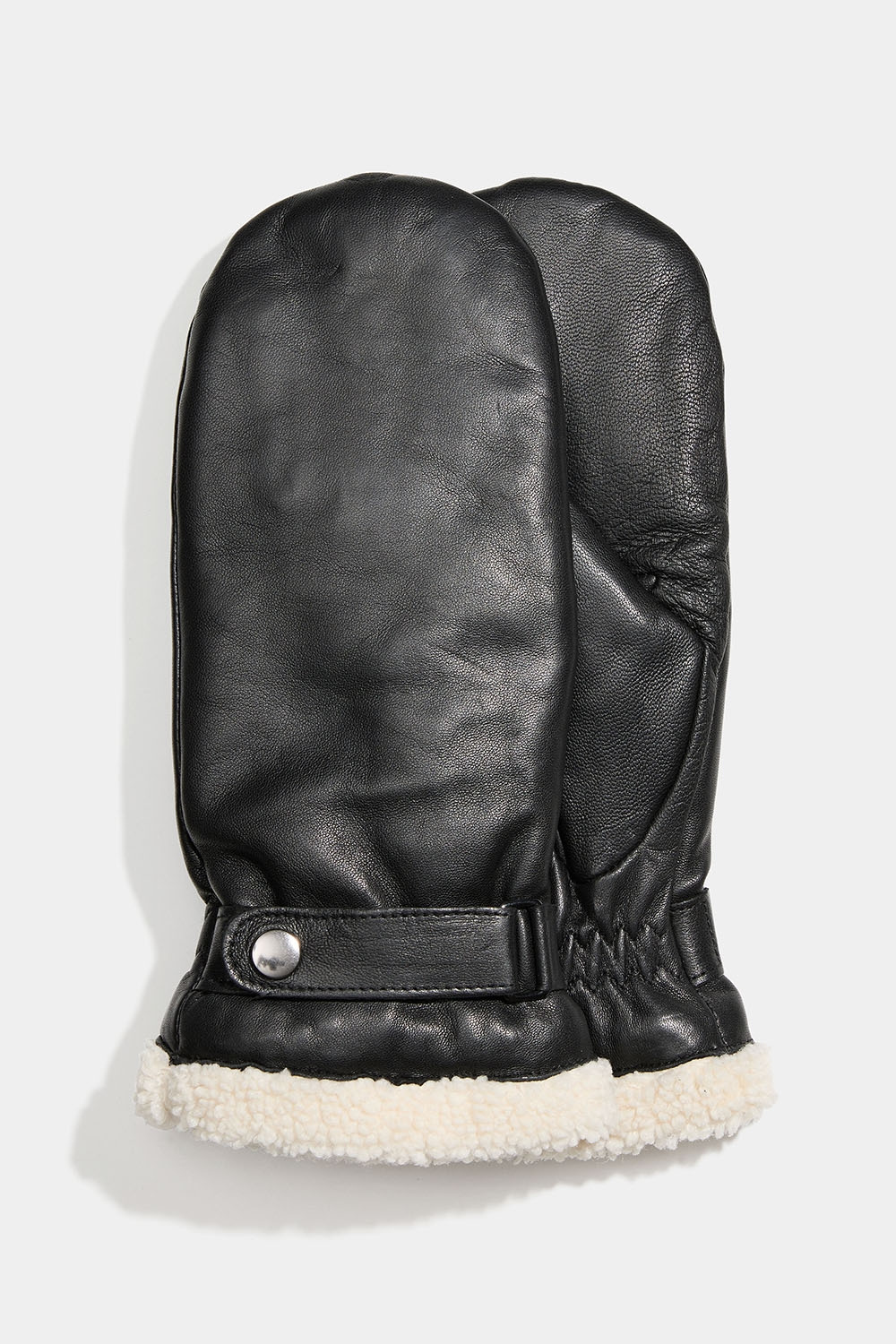 Vanter i sort læder med imiteret shearling