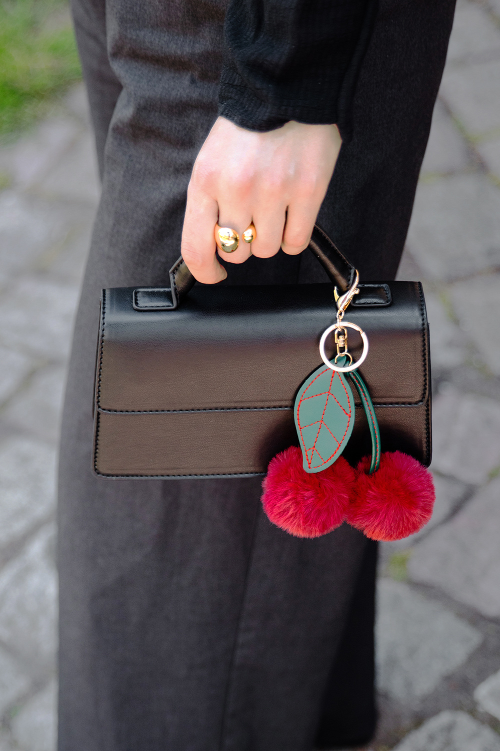 Lille, sort, rektangulær taske