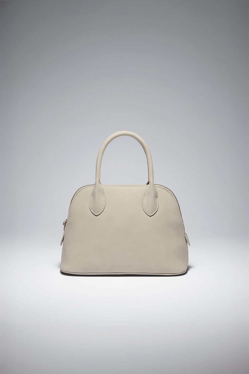 Beige taske i ruskindsimitation