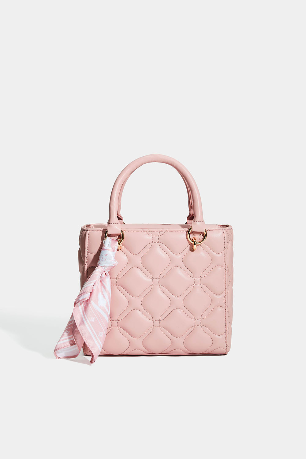 Lyserød taske med quiltet design og tørklæde