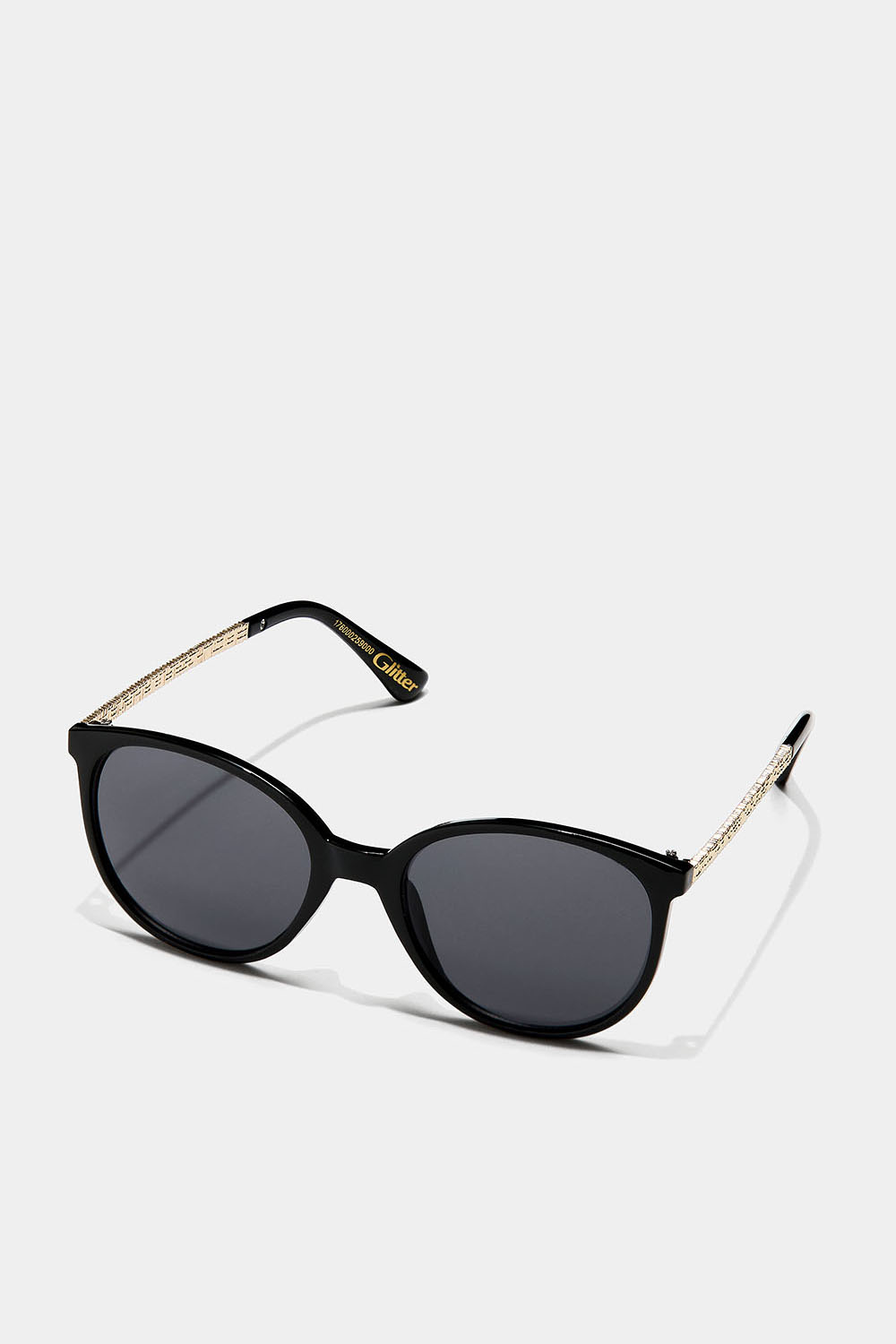 Sorte cateye-solbriller med gulddetaljer