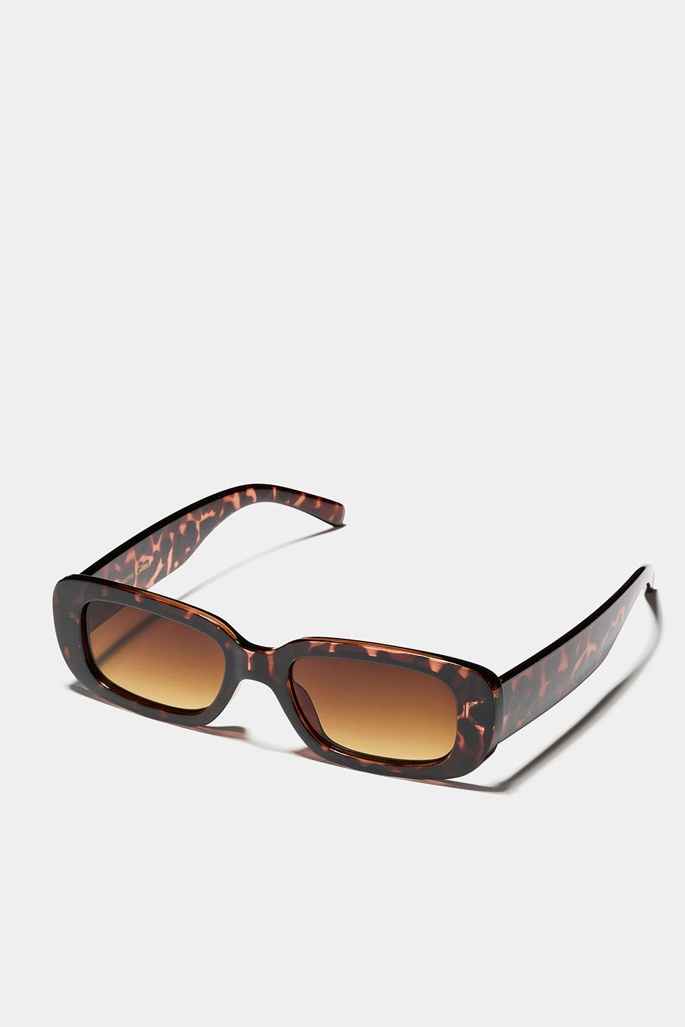 Rektangulære solbriller med skildpaddemønster og afrundede kanter