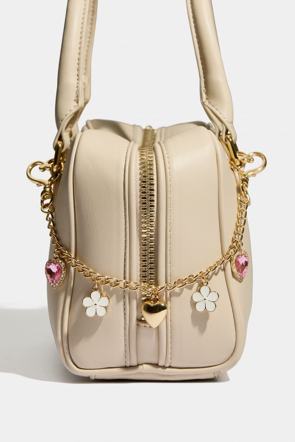 Taskepynt med blomster og hjerter