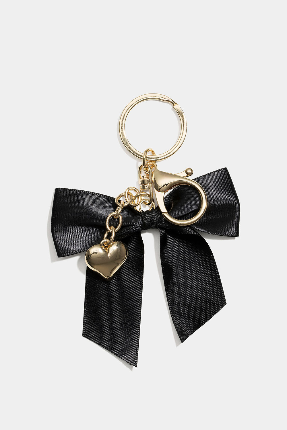 Taskepynt med sløjfe og hjerte