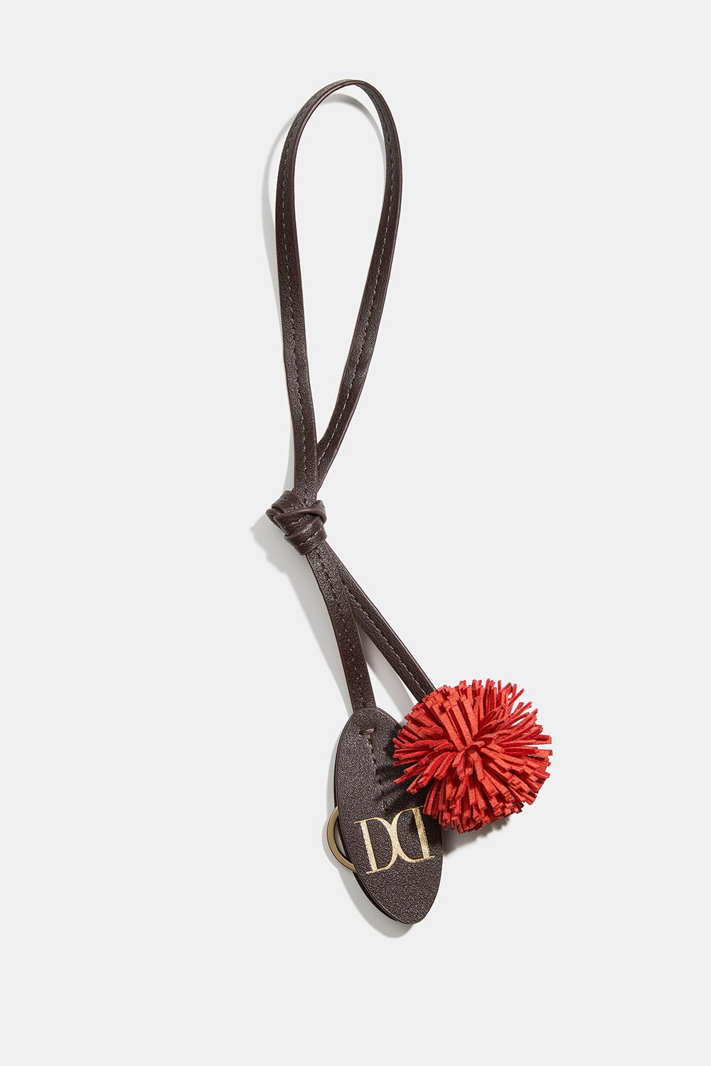 Taskepynt med pompom og nøglering