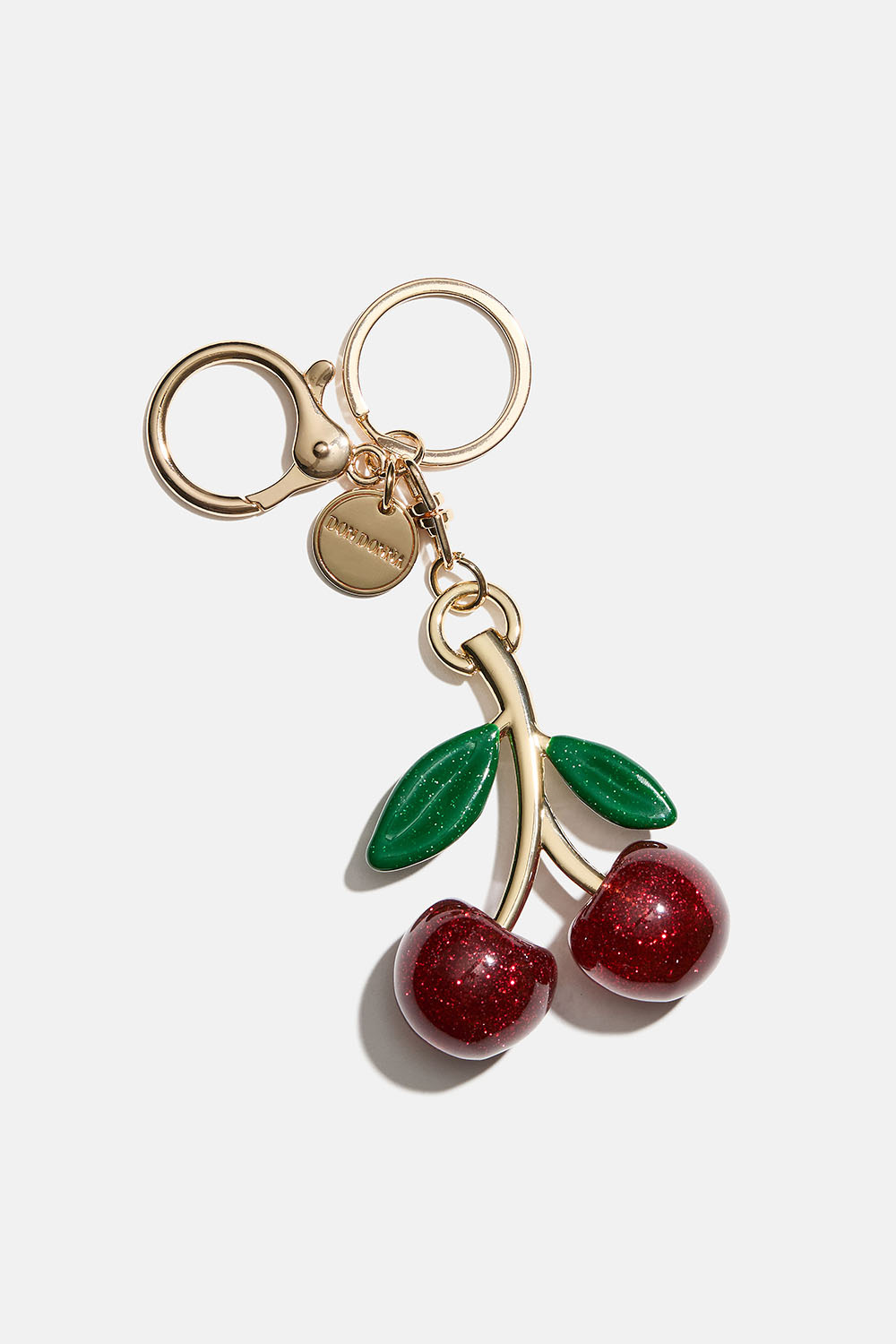 Taskepynt med glitrende kirsebær 