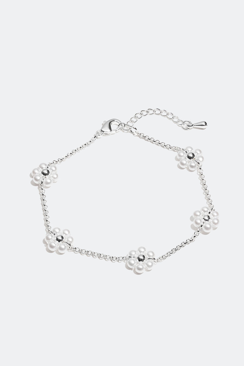 Armbånd med hvide blomster