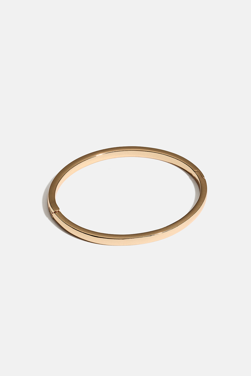 Smal guldfarvet armring